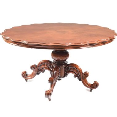Description:VERY FINE VICTORIAN SHAPED TOP MAHOGANY CENTRE TABLE WITH TURNED COLUMN. RAISED ON FOUR SCROLLED CARVED LEGS WITH CASTORS.