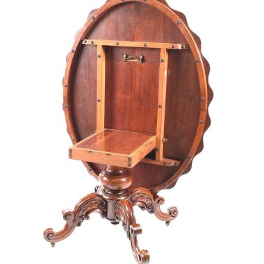 Description:VERY FINE VICTORIAN SHAPED TOP MAHOGANY CENTRE TABLE WITH TURNED COLUMN. RAISED ON FOUR SCROLLED CARVED LEGS WITH CASTORS.