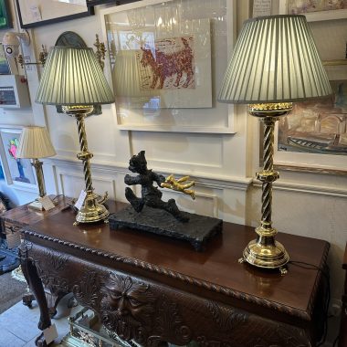A pair of brass 19th century table lamps candlesticks, converted to electricity